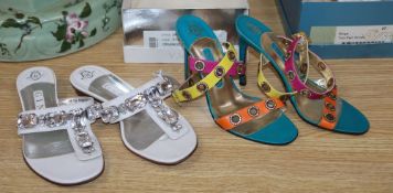 A pair of Gina orange turquoise and pink leather sandals with cross-over ankle straps and cut out