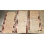 Three North West Persian mats, largest 96 x 54cm