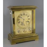 W. Thornhill & Co. A late Victorian gilt brass four glass calendar mantel clock, with gilt Roman