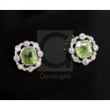 A pair of mid 20th century white gold, peridot and diamond cluster set earstuds, of pierced shaped