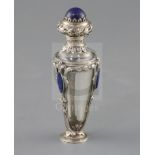 A 19th century French? white metal and lapis lazuli mounted rock crystal? scent bottle and glass