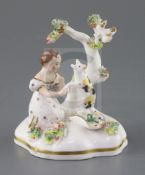 A rare Staffordshire porcelain group of a cat and a girl by a tree, possibly Dudson, c.1835-50,