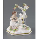 A rare Staffordshire porcelain group of a cat and a girl by a tree, possibly Dudson, c.1835-50,