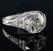 A platinum? and solitaire diamond ring, the round brilliant cut stone weighing approximately 3.