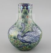 A rare William de Morgan 'Ostrich' bottle vase, c.1888-97, painted by Joe Juster, with a repeating