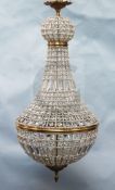 A pair of Empire style cut glass beaded and bronzed metal bag chandeliers, drop 3ft 9in. diam. 1ft