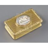 A George IV engine turned silver gilt rectangular snuff box, by Thomas Shaw, the lid with inset oval