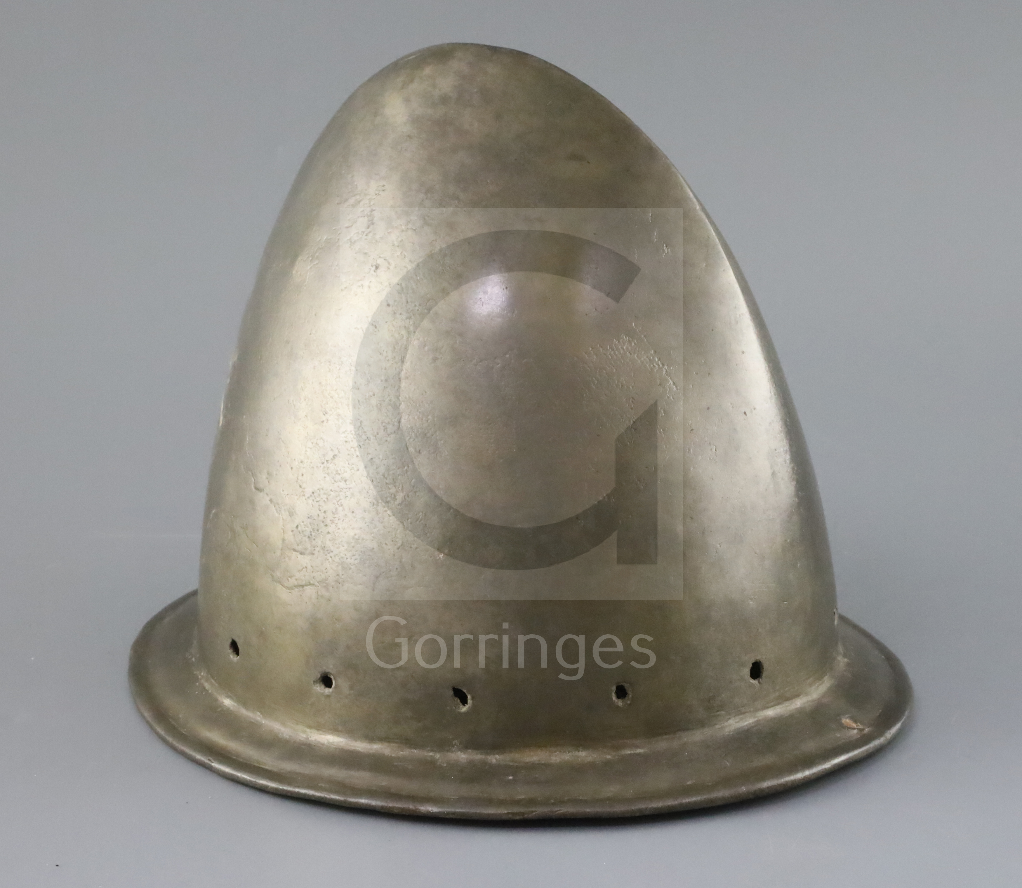 An Italian infantry helmet cabaset c.1580, polished steel raised from a single plate, medial ridge