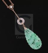 A 1940's/1950's? gold, carved jade and diamond set drop pendant necklace, (chain a.f.), pendant 32mm