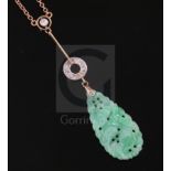 A 1940's/1950's? gold, carved jade and diamond set drop pendant necklace, (chain a.f.), pendant 32mm