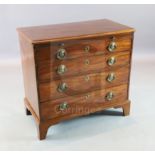 A George III mahogany chest with brushing slide and four graduated long drawers. on bracket feet W.