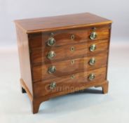 A George III mahogany chest with brushing slide and four graduated long drawers. on bracket feet W.