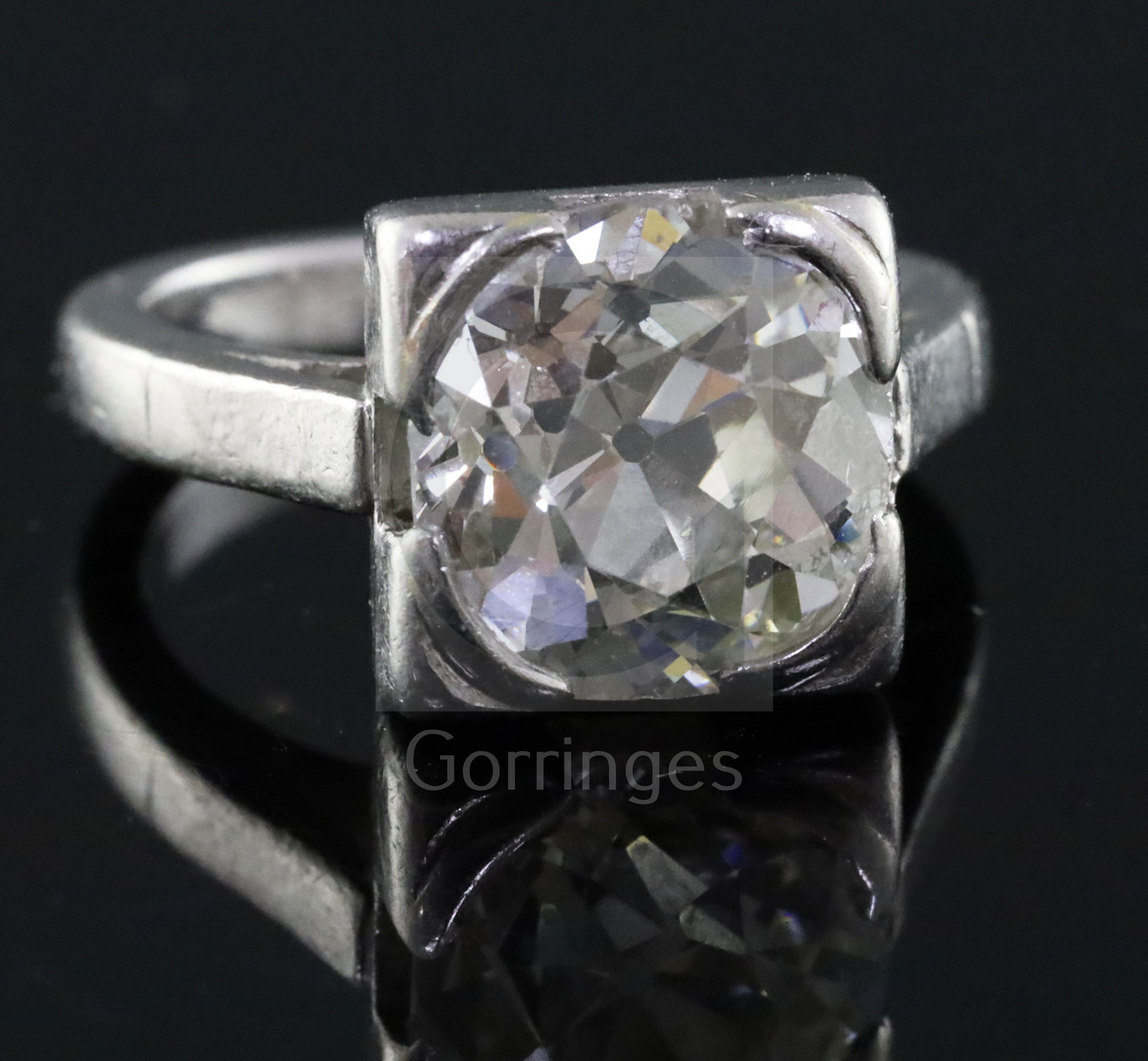 A 1940's? platinum and solitaire diamond ring, the old round cut stone weighing approximately 3.