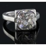 A 1940's? platinum and solitaire diamond ring, the old round cut stone weighing approximately 3.