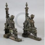 A pair of 19th century French bronze chenets, modelled with sphinx beside squared columns on stepped