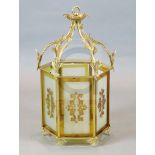 A Victorian style ormolu hall lantern, with foliate scroll and ivy leaf frame, inset with frosted