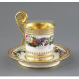 A Sevres cabinet cup and saucer, c.1822, each painted with a band of colourful flowers, the cup with