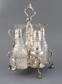 A George III silver five division cruet stand by Robert Hennell I,(a.f.) with three matching casters