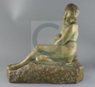 Marcel Bouraine (1886-1948). A French bronzed terracotta figure of a reclining woman, signed,