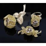 A suite of three items of 18ct gold and diamond set jewellery by Piaget, of floral design,