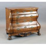 A 19th century Dutch walnut and marquetry bombe commode, with serpentine top and four long