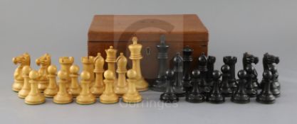 A 4 inch weighted wooden Jaques chess set , ebony and boxwood, in original mahogany box, label under