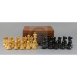 A 4 inch weighted wooden Jaques chess set , ebony and boxwood, in original mahogany box, label under