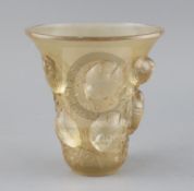 A R. Lalique Saint Francois vase, with brown staining, etched mark 'R. LALIQUE FRANCE', H. 18cm