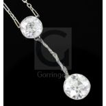 A 1930's/1940's white gold? and two stone diamond set drop pendant necklace (a.f.), the diamonds