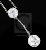 A 1930's/1940's white gold? and two stone diamond set drop pendant necklace (a.f.), the diamonds