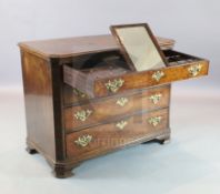 A George III mahogany Chippendale period dressing chest with fitted top drawer and three further