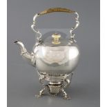 A George II silver bullet shaped tea kettle on stand with burner by George Greenhill Jones?, with