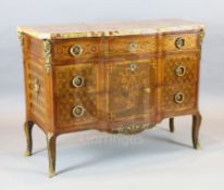 An early 20th century French Transitional style marquetry breakfront commode, with mottled