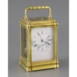 A mid 19th century French lacquered brass hour repeating carriage clock, in gorge case, with