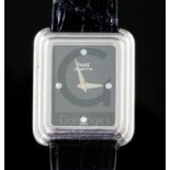 A lady's modern 18k white gold Piaget quartz rectangular wrist watch with diamond chip set dial,