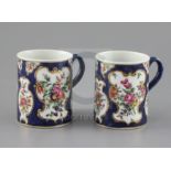 A good pair of small Worcester mugs, circa 1768, of cylindrical form, painted with garlands of