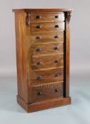 A Victorian mahogany Wellington chest, with crossbanded top and seven drawers, on plinth foot, W.2ft