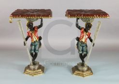 A pair of late 19th century Florentine carved and painted wood blackamoor occasional tables, with