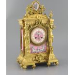 A late 19th century French ormolu and Sevres style porcelain mantel clock, of architectural form,
