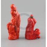 Two Chinese carved coral snuff bottles one with fish beside water plants, the other as a sage,
