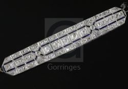 A 1930's/1940's pierced platinum?, synthetic sapphire and diamond set bracelet (a.f.), of canted