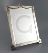 An Edwardian silver rectanglar easel mirror, London, 1904, with swag and ribbon surmount, with