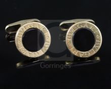 A pair of modern Bulgari 18k, 585(14k) and black onyx set circular cufflinks, 15mm in diameter,
