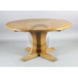 Robert Thompson "Mouseman". An adzed oak centre table, with circular top and saltire underframe