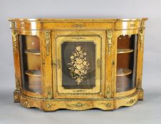 A Victorian marquetry inlaid ormolu mounted figured walnut credenza, of D shaped form with central