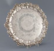 An early Victorian Scottish silver shaped circular salver, by A.G. Whighton, with engraved foliate