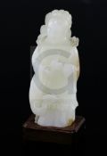 A fine Chinese white and russet jade group of Xi Wangmu and a phoenix, 19th/20th century, the