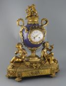 Vernet, Rue du Bac 42. A 19th century French ormolu and bleu du roi porcelain mantel clock, of urn