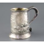 A George III large silver mug, later embossed with sheep grazing in a field with engraved