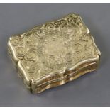 A mid 19th century unmarked gold (tests as 15ct) vinaigrette, in fitted box, with engraved scroll